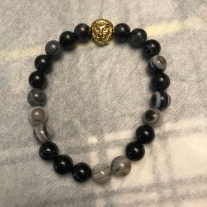 Gray black and gold bead bracelet